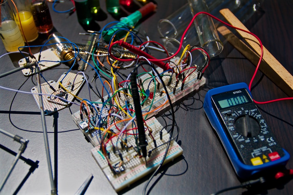 Electrician testing a circuit with a multimeter